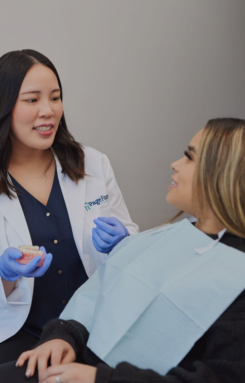 Revere dentist talking to a patient in dental chair