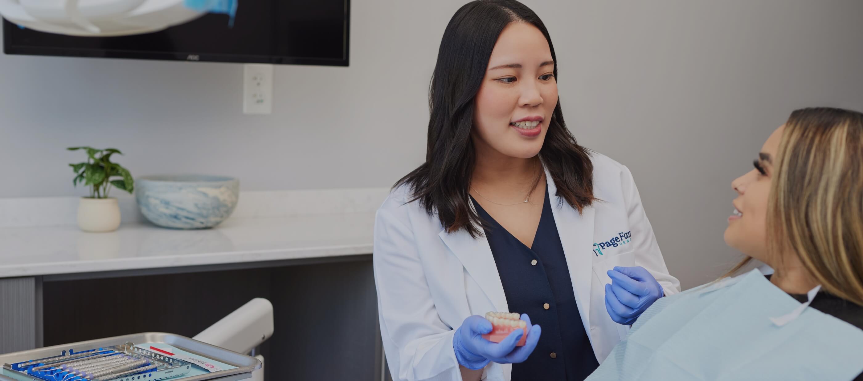 Revere Massachusetts dentist talking to a patient in dental chair