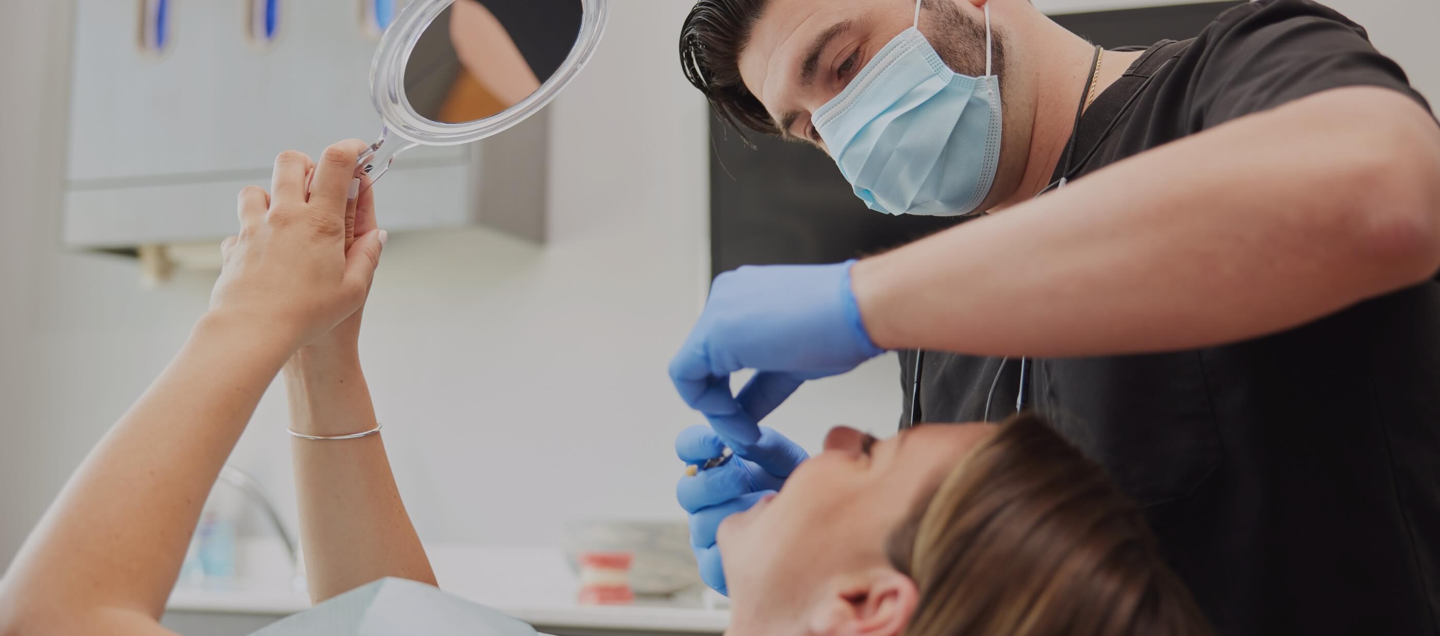 Close up of dentist treating a patient